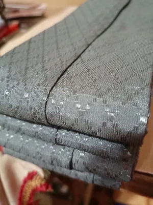 Gorden 200x200 berwarna ungu hijau biru dan kuning dengan motif kotak-kotak tersedia dalam ukuran 100x50 hingga 200x200.