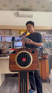 Loa xách tay ONTEKCO TX 201- kèm 2 micro không dây 1 bass 1 treble thiết kế nhỏ gọn pin dùng từ 3-4 giờ bảo hành 12 tháng