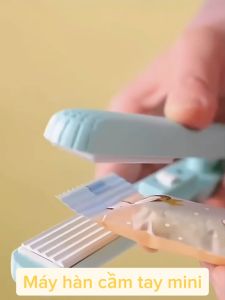 Máy hàn miệng túi mini cầm tay máy kẹp hàn nhiệt túi bóng đóng trà hoa bánh kẹo