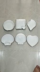 dĩa sứ hình vỏ sò sọc viền đen