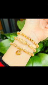 vòng tay dáng chuỗi đá thạch anh tóc vàng tự nhiên vip mix đồng điếu và túi tiền thạch anh tóc vàng vip bọc vàng tây vòng tay đá phong thủy hợp mệnh kim mệnh thổ trang sức thiết kế đủ hóa đơn thẻ bảo hành