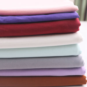 ผ้าคอตตอนแท้คุณภาพสูงสำหรับเสื้อยืด ผ้าล็อคเก็ตทรงเข้ารูป ผ้าสีพื้นยืดหยุ่นได้ ผ้าสำหรับงานฝีมือ DIY