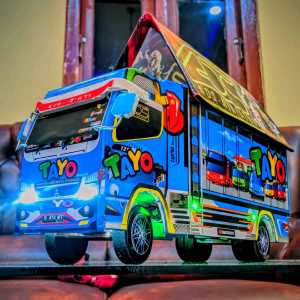 MAINAN ANAK MINIATUR TRUK OLENG BERKARAKTER KARTUN TAYO BERVARIASI LAMPU TERPAL DAN OLENG