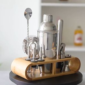 Finelife 12 Pieces/set 750ml Stainless Steel Shaker Bar Set: A Complete Guide\\n\\n Introduction to Finelife 12 Pieces/set 750ml Stainless Steel Shaker Bar Set\\n\\nFinelife has introduced a versatile and durable 12-piece stainless steel shaker bar set, perfect for party enthusiasts and bartenders alike. This comprehensive guide will walk you through the features, benefits, usage, and maintenance of this high-quality cocktail shaker set.\\n\\n Key Features of the Finelife Shaker Set\\n\\n- **Stainless Steel Construction:** Made from premium-grade stainless steel, these shakers are built to last and resist corrosion.\\n- **12-Piece Set:** Includes two 750ml shakers, two strainers, two jiggers, two mixing spoons, two muddlers, one Hawthorne strainer, and one jigger measuring cup.\\n- **White Wine & Red Wine Shaker:** A unique feature, allowing users to shake white and red wine cocktails with ease.\\n\\n Benefits of Using the Finelife Shaker Set\\n\\n- **Durability:** The high-quality stainless steel construction ensures longevity and resistance to wear and tear.\\n- **Versatility:** The extensive range of tools included in the set makes it perfect for preparing various cocktail recipes.\\n- **Professional Look:** The sleek design and polished finish make this set a stylish addition to any bar setup.\\n\\n How to Use the Finelife 12 Pieces/set 750ml Stainless Steel Shaker Bar Set\\n\\n Mixing Drinks with the Finelife Shaker Set\\n\\nTo mix drinks using the Finelife shaker set, follow these steps:\\n\\n1. Add ingredients to the shaker.\\n2. Fill the shaker with ice.\\n3. Securely close the lid.\\n4. Shake vigorously for about 10 seconds.\\n5. Strain the mixture into a glass using one of the included strainers.\\n\\n Cleaning and Maintaining the Finelife Shaker Set\\n\\nAfter using the shaker set, rinse it thoroughly with warm water. For stubborn stains, use mild dish soap and a soft sponge. Dry the set completely before storing it in a cool, dry place.\\n\\n Why Choose the Finelife 12 Pieces/set 750ml Stainless Steel Shaker Bar Set\\n\\n Durability and Quality of the Finelife Shaker Set\\n\\nThe stainless steel construction ensures that this shaker set will last for years, even with frequent use. Its high-quality materials and workmanship make it a reliable choice for both home bartenders and professional mixologists.\\n\\n Versatility of the Finelife Shaker Set\\n\\nWith its extensive range of tools, the Finelife shaker set can handle a wide variety of cocktail recipes. From classic cocktails to unique creations, this set has everything you need to craft delicious drinks.\\n\\n Finelife 12 Pieces/set 750ml Stainless Steel Shaker Bar Set as a Gift\\n\\n Perfect Gift Idea for Bartenders and Party Lovers\\n\\nWhether you're shopping for a professional bartender or a party enthusiast, the Finelife shaker set is an excellent gift choice. Its sleek design and practical features make it a valuable addition to any bar setup.\\n\\n White Wine & Red Wine Shaker: A Unique Feature\\n\\nThe white wine and red wine shaker is a standout feature of this set, allowing users to shake both white and red wine cocktails with ease. This unique tool adds versatility to the set and opens up new possibilities for cocktail creation.\\n\\n Conclusion\\n\\nThe Finelife 12 pieces/set 750ml stainless steel shaker bar set is a must-have for anyone passionate about mixing drinks. With its durable construction, extensive range of tools, and unique features, this set is perfect for both home bartenders and professional mixologists. Don't miss out on this fantastic gift idea for the party lover in your life!\n}