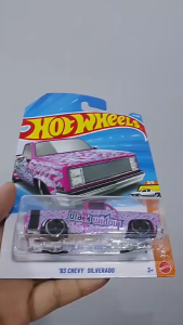 Hot Wheels 83 Chevy Silverado Black Widow toy car with pink
