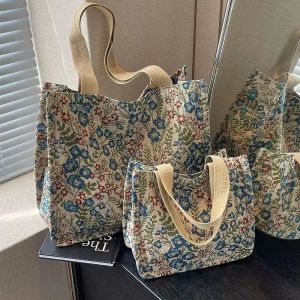 กระเป๋าสะพายไหล่ผ้าใบความจุขนาดใหญ่สำหรับผู้หญิง กระเป๋าถือแบบลำลองสำหรับใช้ในชีวิตประจำวัน กระเป๋าสะพายไหล่ผ้าลายดอกไม้สำหรับใส่ไปทำงานและเรียนรู้