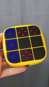 OSSDE Tic Tac Toe Bolt Game 4-in-1 Handheld Puzzle Game Console Electronic Infinites Travel Games