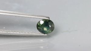 70 ตุ๊กตา เสื้อ พลอยเขียวส่อง เผาเก่า สีเขียว ทรงไข่ บางกะ