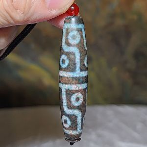 59.5mm Aged Tibetan Xang Xung (Zhang Zhung) 12 Eyes Dzi blue hue with lots of small red spots pendant