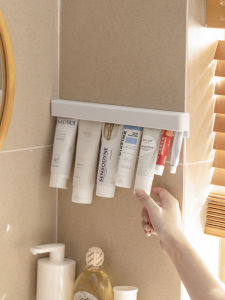 Wall-Mounted Toothpaste Organizer Holder No-Drill Bathroom Storage Rack for Toothpaste And Face Wash Gel Clip on Toothbrush Holder