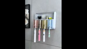Joybos Multifunctional Upgrade Wall Mounted Toothbursh Holder Organizer with Cups for Bathroom Punch Free and Waterproof Dispensers No Drilling Toothpaste Dispenser Shelf