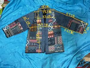 เสื้อลายผ้าต่อ