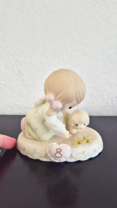 Precious Moments growing in grace age 8 girl playing marbles with a puppy
