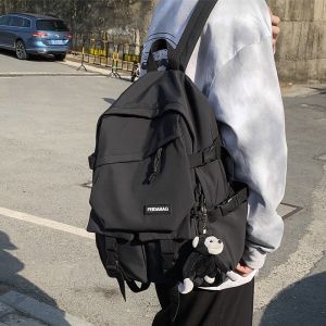 High School Student Backpack Large Capacity Dual Shoulder Travel Lightweight Black Bag Simple Design for Men And Women