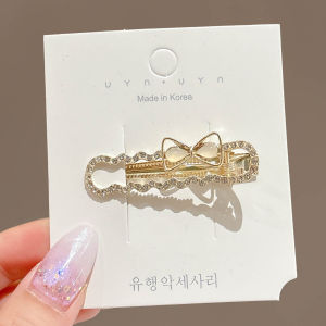 NING ZHOU | Crystal Pearl Cats Eye Rhinestone Bow Alligator Clip