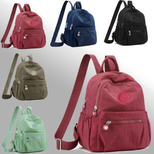 Neutral color backpack for men and women made of nylon material suitable for travel and study. It has multiple pockets.