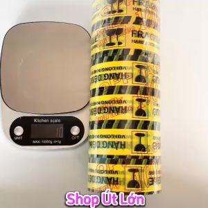 Băng keo hàng dễ vỡ 100yard nặng 1kg rộng 47cm lõi giấy 5mm 1 cây có 6 cuộn. Mua từ 6 cây được kèm dao cắt băng keo