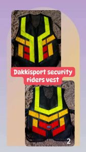 Dakkisport security riders vest with reflective yellow and red accents for visibility.