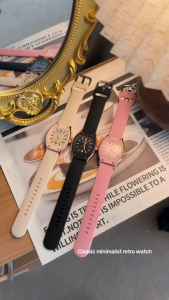 A student quartz ladies wristwatch with a small champs-style wine barrel square silicone strap