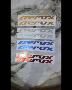 AEROX V1 / V2 / V3 – CNC Alloy Bendable Emblem with Adhesive