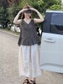 Elegant Silk-Linen Blend Two-Piece Set Women's V-Neck Flared Sleeveless Top and Wide Leg Crop Pants. 