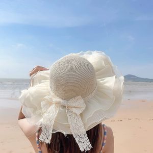 ฤดูร้อนแฟชั่นหมวกฟางหมวกติดโบว์ขนาดใหญ่สำหรับผู้หญิงหมวกบังแดดการป้องกันแสงแดดชายหาดอเนกประสงค์เดินทาง