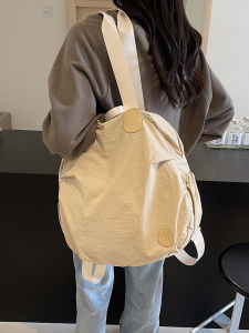 กระเป๋าเป้สะพายหลังผ้าไนลอนกันน้ำสำหรับผู้หญิง กระเป๋าใส่ของสำหรับเดินทางแบบอเนกประสงค์ ความจุขนาดใหญ่ กระเป๋าเป้สะพายหลังแบบใช้งานได้สองทาง