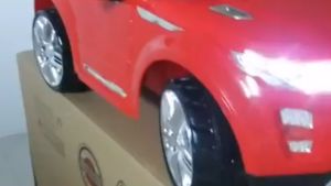 Land Rover kids electric car four-wheel swing car toy car can sit people boys and girls remote control car
