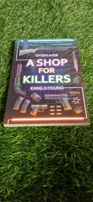 BUKU NOVEL A SHOP FOR KILLERS BY KANG JI YOUNG