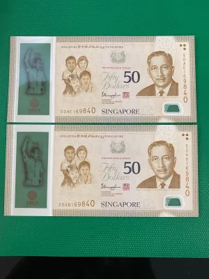 One pair same number of Singapore $50 SG50 Commemorative notes