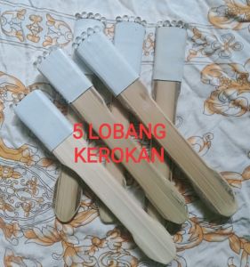 KEROKAN KELAPA MUDA 5 LOBANG
