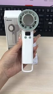 SG Portable Handheld Fan 5-Speed Adjustable Semiconductor Ice-Cooling Fan Digital Display 2000mAh Desktop Fan Outdoor Fan with Hook