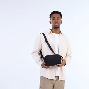 OZUKO black crossbody bag with adjustable strap and multiple compartments.