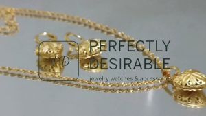 18 Gold Heart with Flower Design Necklace and Earrings Set.