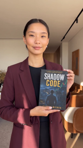 Shadow Code by Gaurav Mishra - Financial thriller with stock market charts and cityscape.