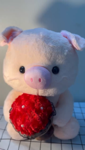 Gấu Bông Heo Hồng Cầm Hoa Dễ Thương – Thú Nhồi Bông Heo Lông Mềm Quà Tặng Sinh Nhật Valentine