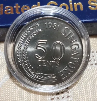 Vintage Singapore 50-cent Lionfish coins