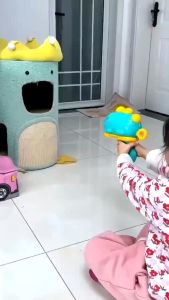 Đồ chơi súng khủng long ném bóng dính súng bắn phi tiêu cho bé