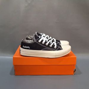 SEPATU CNVRS 70S LOW X SUICIDAL TENDENCIES LOW HITAM PUTIH SOL GLOSSY 38-43