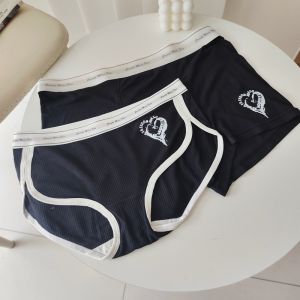 กางเกงชั้นในทรงสามเหลี่ยมผ้าโมดอลคอตตอนสำหรับคู่รักสีครีม กางเกงชั้นในชายทรงสี่เหลี่ยม กางเกงชั้นในผู้หญิงทรงสามเหลี่ยม สไตล์กีฬา กางเกงชั้นในผ้าฝ้ายลายหัวใจ