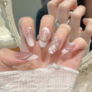 เล็บปลอมแบบกดติด 10 ชิ้น ลายตาแมวสีชมพูมุกฝรั่งเศส พร้อมอุปกรณ์ 4 ชิ้น และกาวติดเล็บแบบแผ่น แข็งแรงเป็นพิเศษ