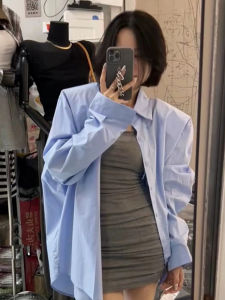 เสื้อเชิ้ตแขนยาวผู้หญิงสีน้ำเงิน ทรงหลวมสบายๆ ป้องกันแสงแดด ทรงหลวมสบายๆ ฤดูใบไม้ผลิและฤดูใบไม้ร่วง 2024 ใหม่ระดับไฮเอนด์