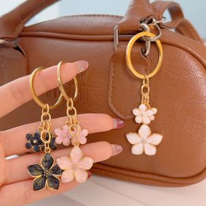 【♡Lovely girls house♡】พวงกุญแจพู่ห้อยรูปดอกไม้แฟชั่นสำหรับที่ใส่กุญแจรถผู้หญิงเด็กผู้หญิง