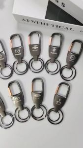 พวงกุญแจ  พวงกุญแจโลโก้เทาทอง (พร้อมห่วง2ชิ้น) สำหรับแขวน กุญแจรถยนต์ กุญแจมอเตอร์ไซค์ กุญแจบ้าน