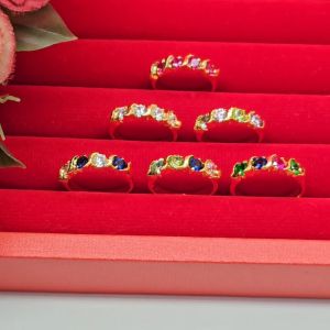 แหวนทองฝังพลอย นพเก้า พลอยสังเคราะห์ ตัวเรือนสีทอง รวมเสริม ได้เงินที่น้ำ นพเก้า น้ำมันพลอยสังเคราะห์ ตัวเรือนสีทอง ทับทิม น้ำมัน น้ำเกินเท่า น้ำมันพลอย สำหรับน้ำเงิ