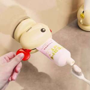 Cute Whale Manual Toothpaste Squeezer Storage Rack with Suction Cup Toothpaste Rolling Dispenser Facial Cleanser Squeeze Clip