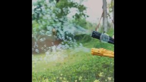 Mainan anak pistol elektrik tembakan gelembung sabun machine electric gatling bubble gun