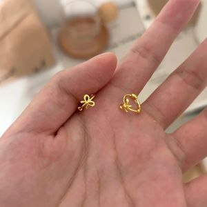 ต่างหูแบบหัวเข็มขัดรูปผีเสื้อ S925 ทองคำขาวสำหรับผู้หญิง ต่างหูแบบทันสมัย ​​ที่ไม่ต้องถอดออกเมื่อนอน