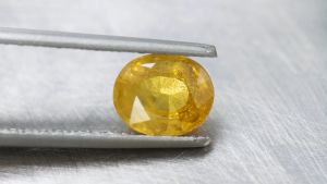 1.45 ct พลอยแท้ บุษราคัม ทรงไข่ สีเหลือง เผาเก่า บางกะจะ