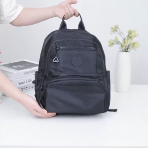 ABC BAGS#5861 Trendy 13inches 2n1 backpack for Women features front pocket top zipper pocket and dual side pockets.